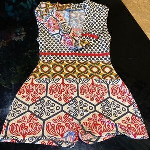 Iridescent sparkles all over this sleeveless romper size 0